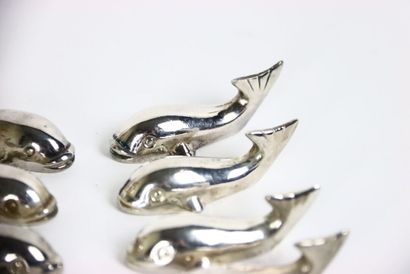 Meeting of twelve silver plated knife holders...
