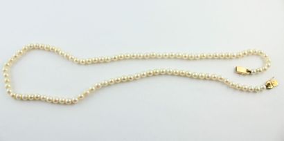 Necklace decorated with cultured pearl, the...