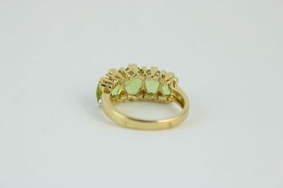 Bague jarretière en or jaune 18K (750/1000)...