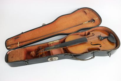 Study violin in its case. A bow is attached...