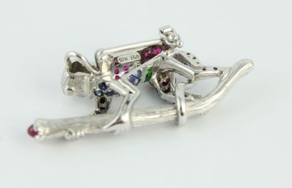 Broche en or gris 18K (750/1000) dans le...