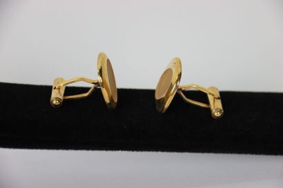 Pair of gold plated cufflinks in its case....