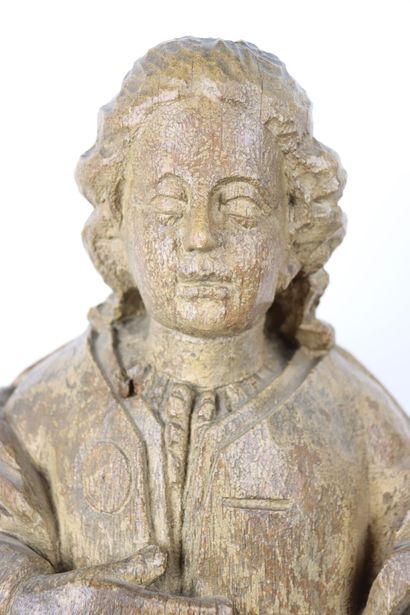 Saint personnage en bois sculpté, dos ébauché....