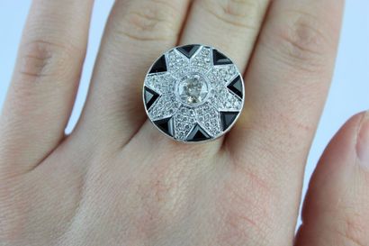 Bague en or jaune et gris 18K (750/1000)...