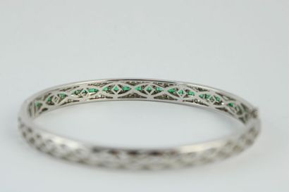 Bracelet jonc en or gris 18K (750/1000) orné...