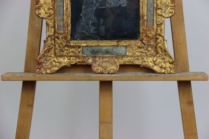 Carved and gilded wood mirror with openwork...