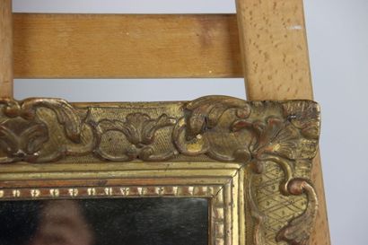Carved and gilded wood mirror with foliage...