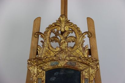 Carved and gilded wood mirror with openwork...
