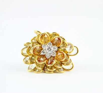 Bague or jaune et gris 18K (750/1000) formant...