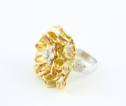 Bague or jaune et gris 18K (750/1000) formant...