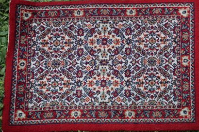 Carpet mécanique à décor floral géométrique....