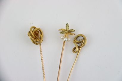 3 gold tie pins, 1 gold and white pearl pendant....