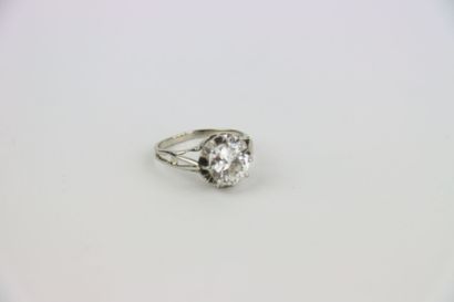 1 gold ring set with a 2 ct old-cut diamond...