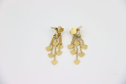 1 gold cross pendant, 1 gold and violet stone...