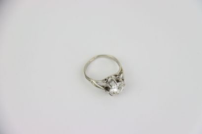1 gold ring set with a 2 ct old-cut diamond...