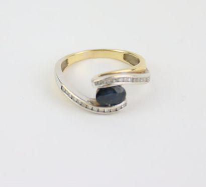 1 gold ring set with 1 blue center stone...