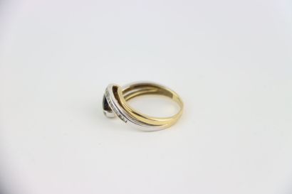 1 gold ring set with 1 blue center stone...