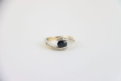1 gold ring set with 1 blue center stone...