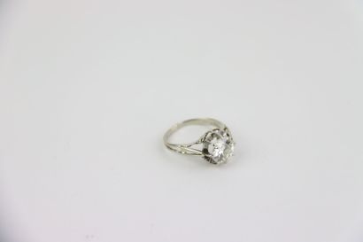 1 gold ring set with a 2 ct old-cut diamond...