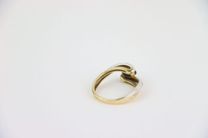 1 gold ring set with 1 blue center stone...