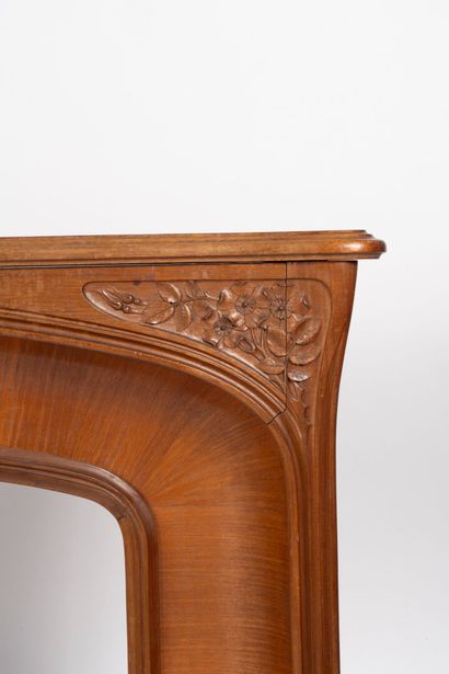 Mantel surround in mahogany and carved mahogany...