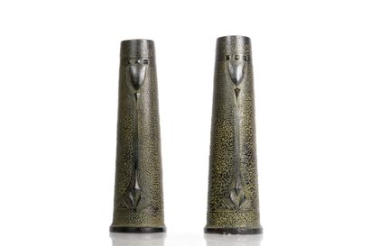 Pair of vases in glazed terra cotta. 
Geometric...