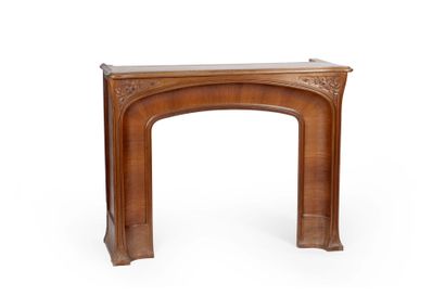 Mantel surround in mahogany and carved mahogany...