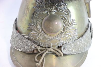 Casque de pompier modèle 1852.
Bombe en laiton,...