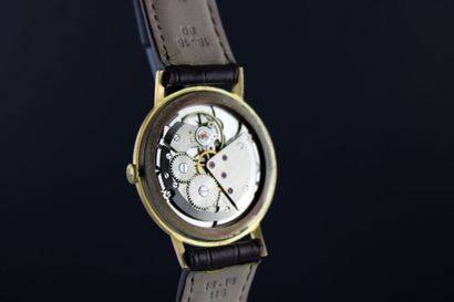SIGMA-VALMON
Montre bracelet en or jaune...