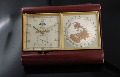 ANGELUS
Station worldtime gainé de cuir rouge.
Indication...