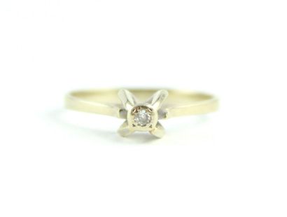 Bague solitaire en or gris18K (750/1000)...