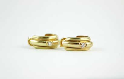 PIAGET
Paire de boucles d'oreilles en or...