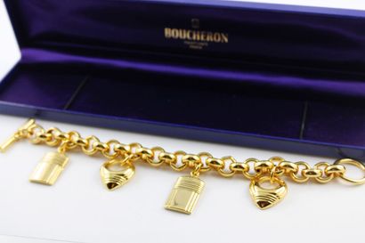 BOUCHERON 
Bracelet en métal doré fantaisie...