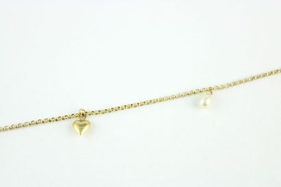 Bracelet en or jaune 18K (750/1000) mailles...