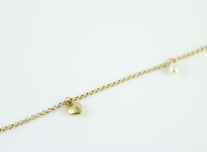 Bracelet en or jaune 18K (750/1000) mailles...