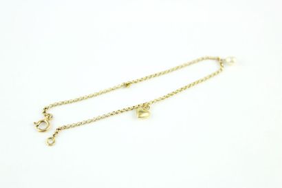 Bracelet en or jaune 18K (750/1000) mailles...