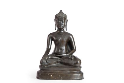Bouddha en bronze à patine brune assis en...