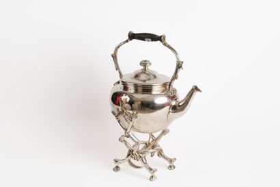 CHRISTOFLE
Théière à bascule et son réchaud...