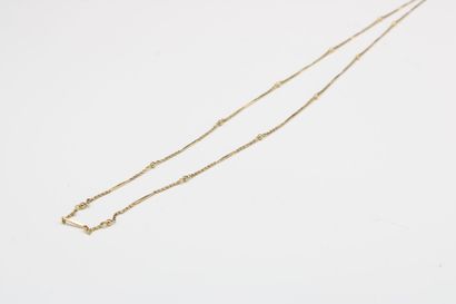 Necklace composed of a chain and a cylindrical...