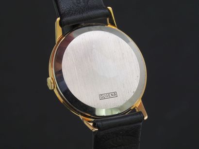 DUGENA
Montre de poignet plaqué or. Boitier...