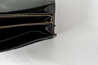 LOUIS VUITTON 
Pochette / compagnon en cuir...