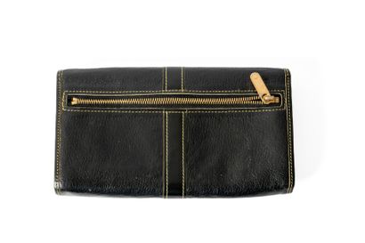 LOUIS VUITTON 
Pochette / compagnon en cuir...