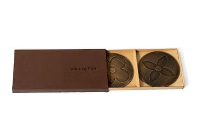 LOUIS VUITTON 
Set de deux dessous de verre...