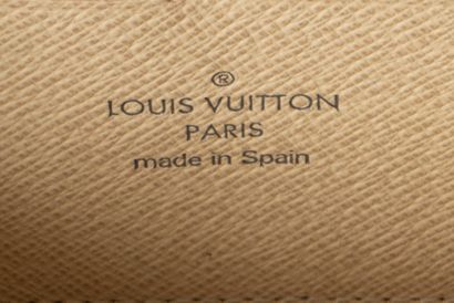 LOUIS VUITTON 
Compagnon en toile monogramme...