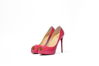 LOUBOUTIN
Fuchsia pink platform with red...