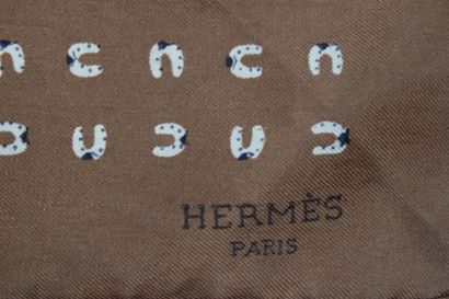 HERMES 
Silk gavroche with horseshoe design.
Dimensions:...