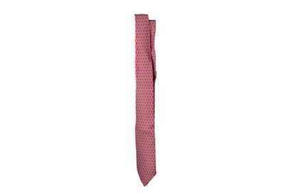 HERMES
Silk tie with interlaced bit pattern.
Used...