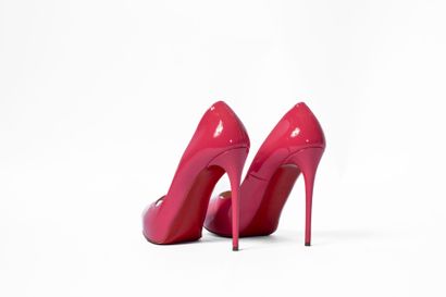 LOUBOUTIN
Fuchsia pink platform with red...