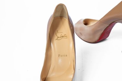 LOUBOUTIN
Cream platform with metal heel,...