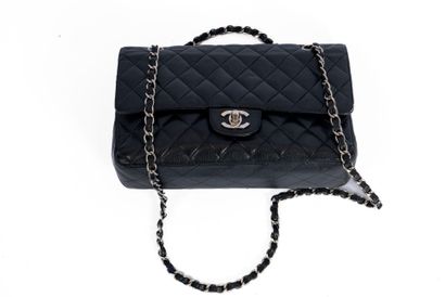 CHANEL 
Classic bag with 25 cm double flap....